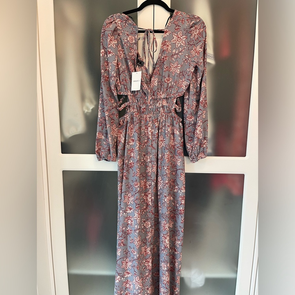 NWT - Floral maxi dress with cut out sides.